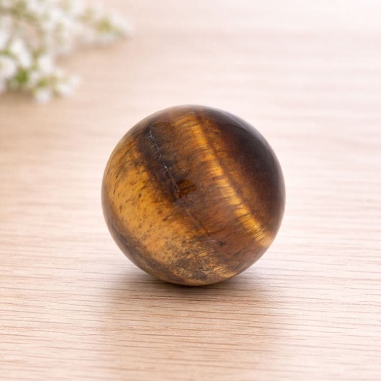 Kugelförmiger Edelstein - Tigerauge – Bild 3